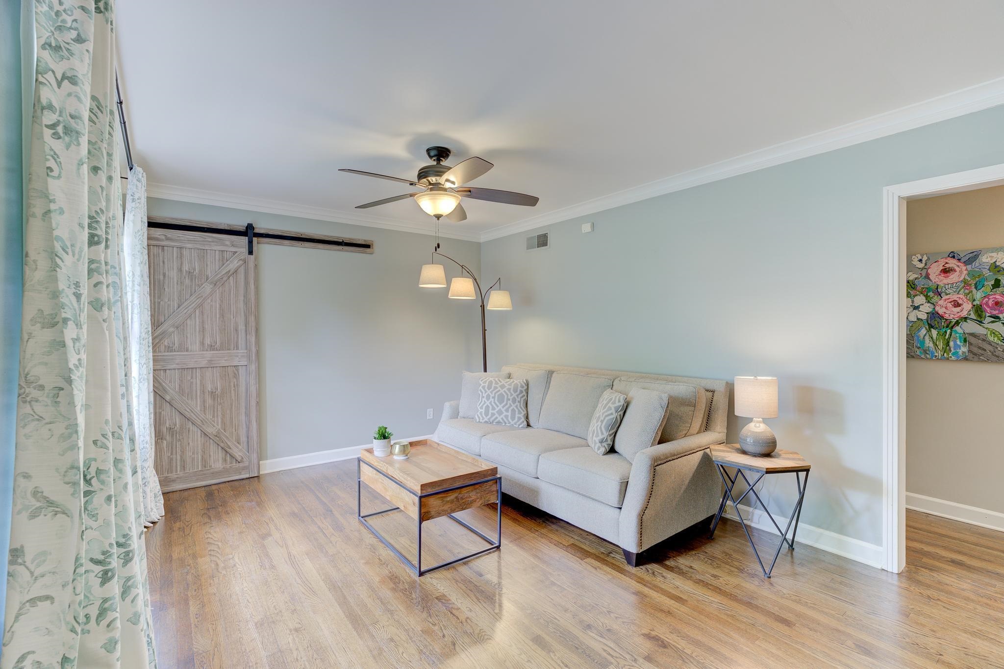 4681 Kaye Road Memphis, TN 38117 - Photo 5 of 25 a living room with furniture and a wooden floor