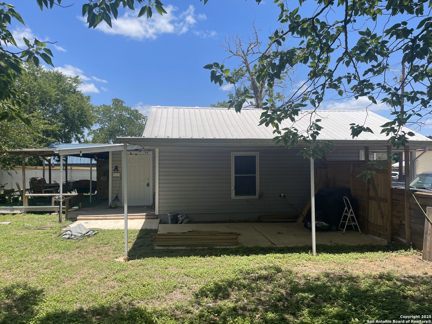 103 South 3rd Street Stockdale, TX 78160 - Photo 27 of 30 a house view with a backyard space