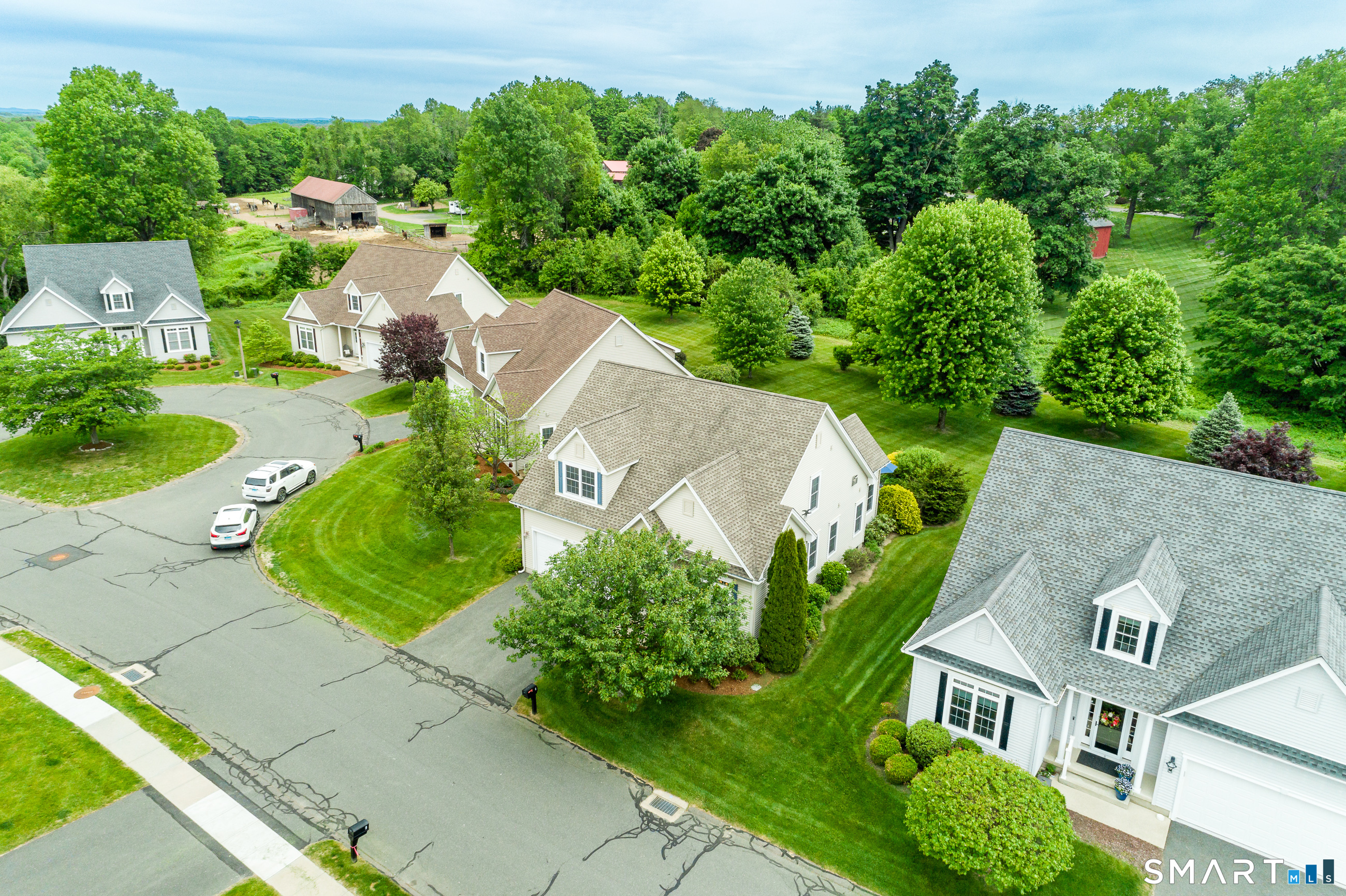 8 Greendale Drive, Unit 8 Suffield, CT 06078 - Photo 4 of 40 an aerial view of a house with yard swimming pool and outdoor seating