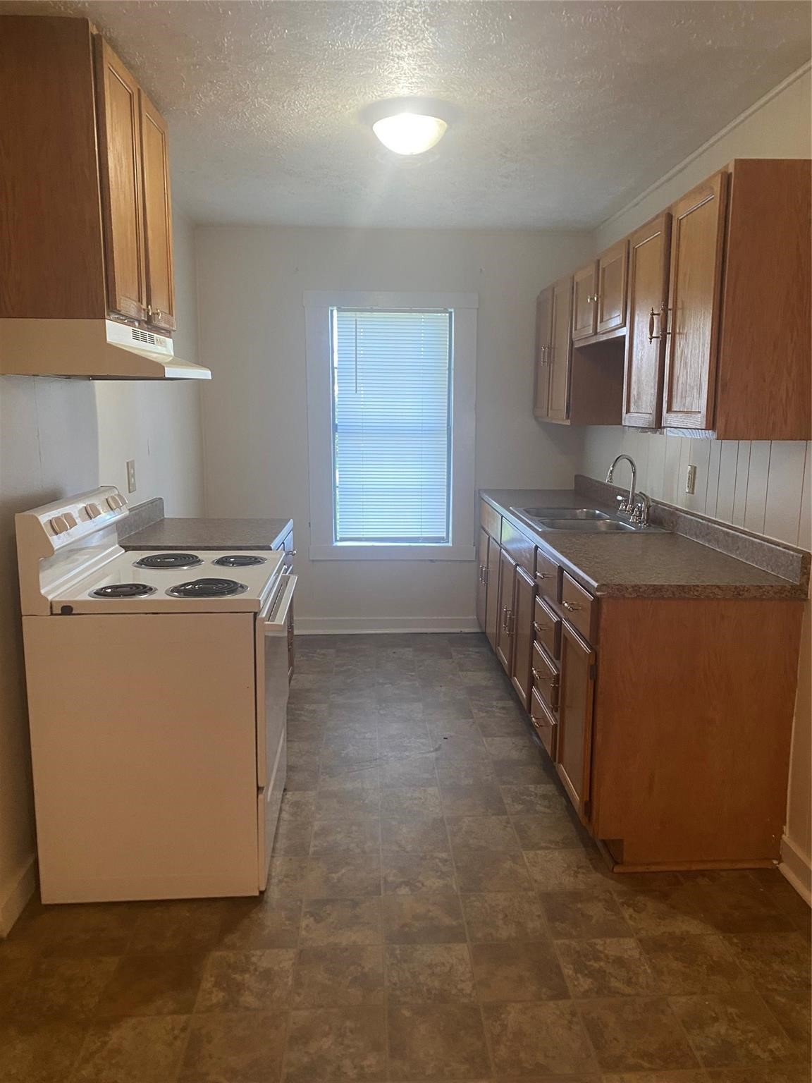 1021 Nottingham Drive Angleton, TX 77515 - Photo 2 of 8 a utility room with two washing machine