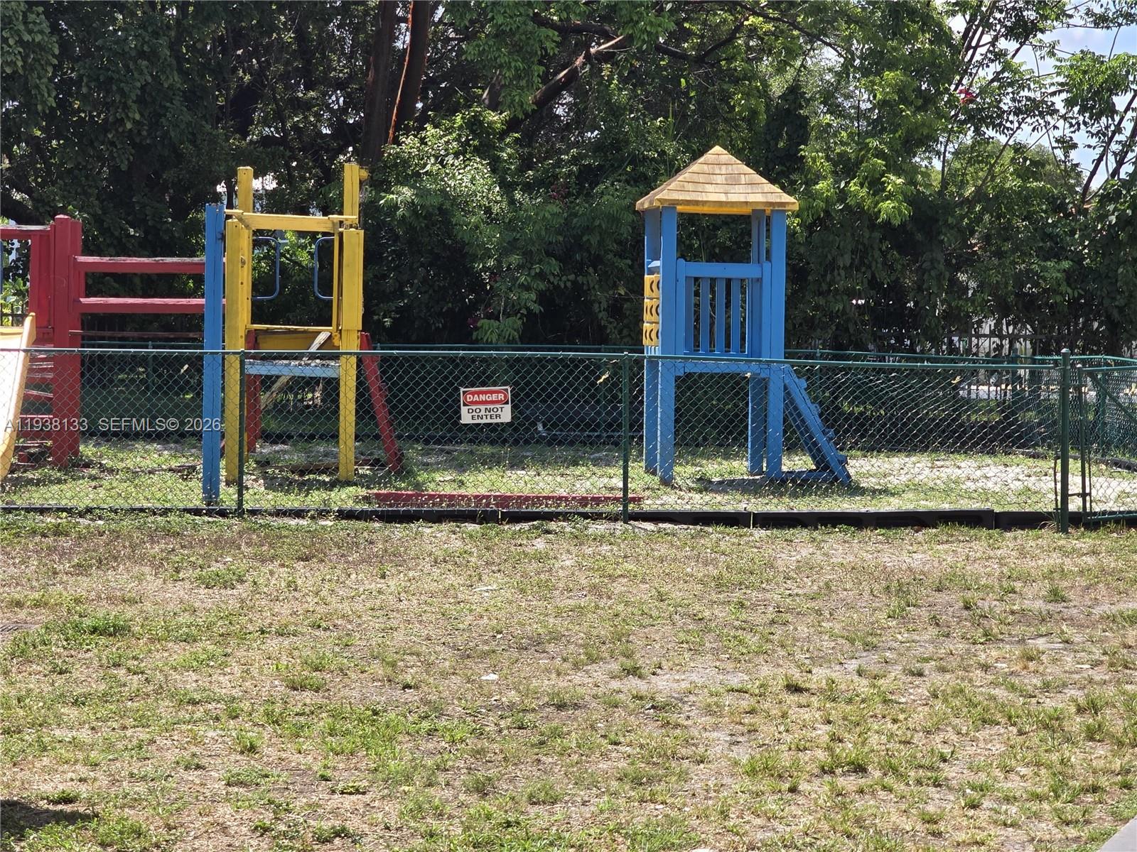 8255 Southwest 152nd Avenue, Unit E207 Miami, FL 33193 - Photo 11 of 14 a house view with a garden space