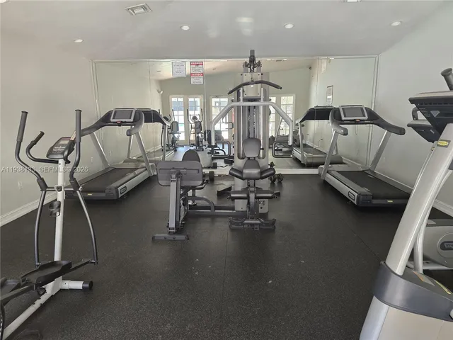 a view of a room with gym equipment