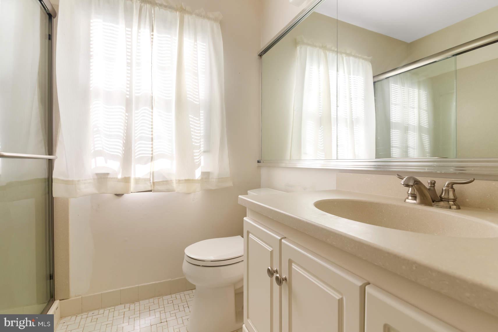 6 Spruce Road Hightstown, NJ 08520 - Photo 8 of 9 a bathroom with a sink and a toilet