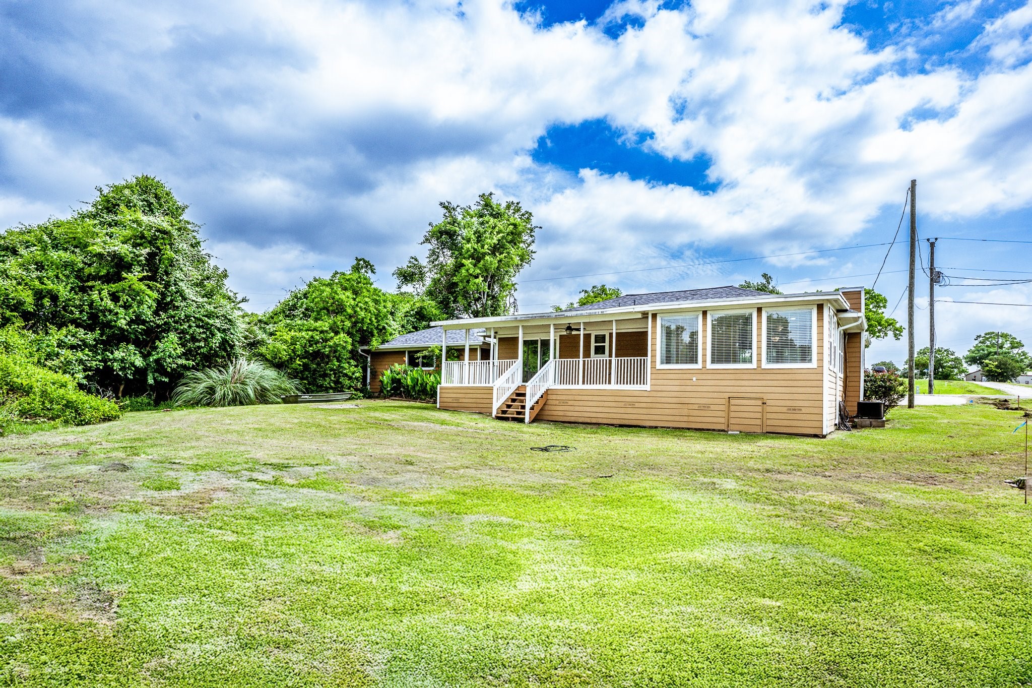 280 Crestmont Point Blank, TX 77364 - Photo 21 of 25 a house that has a big yard and large trees