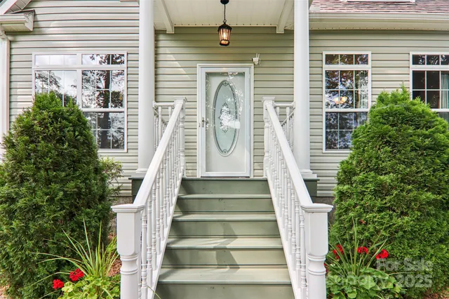 a view of a yard and trees