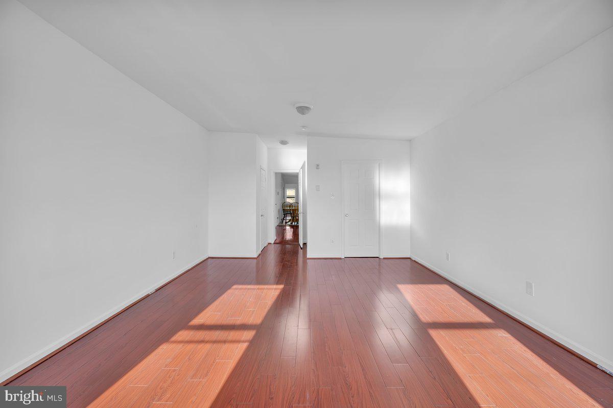 3151 Richmond Street, Unit 3 Philadelphia, PA 19134 - Photo 16 of 22 a view of empty room with wooden floor