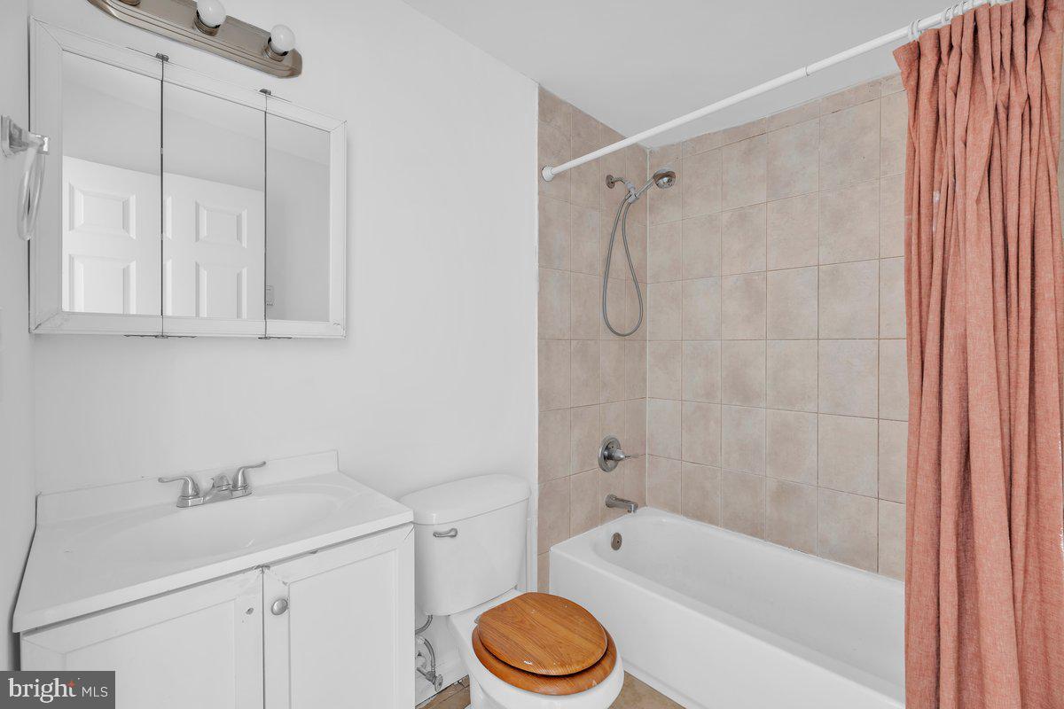 3151 Richmond Street, Unit 3 Philadelphia, PA 19134 - Photo 19 of 22 a bathroom with a sink toilet and shower