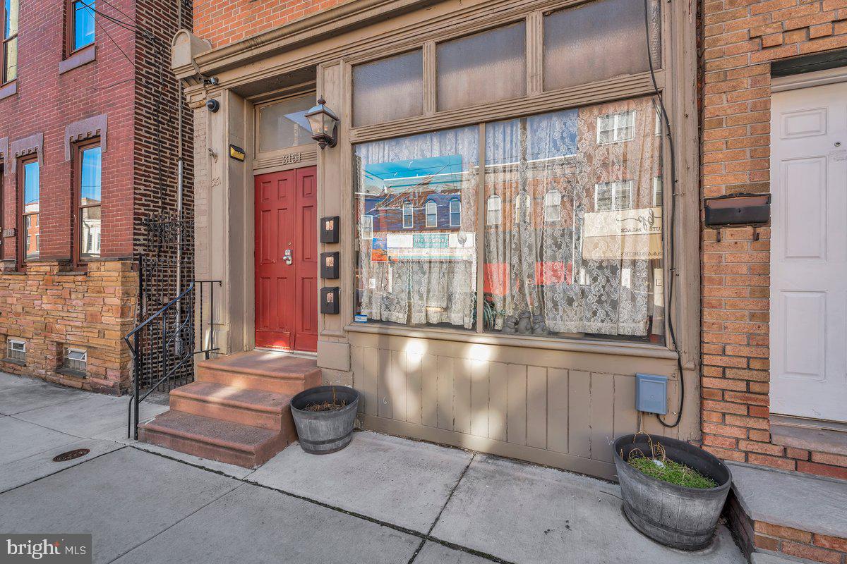 3151 Richmond Street, Unit 3 Philadelphia, PA 19134 - Photo 4 of 22 a front view of a house with outdoor seating