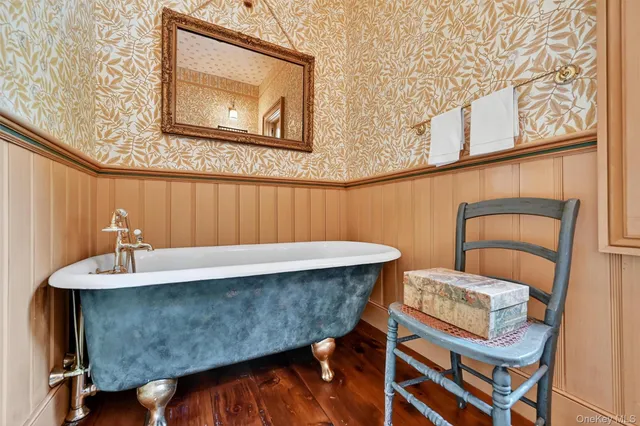 a view of a chairs and table in patio