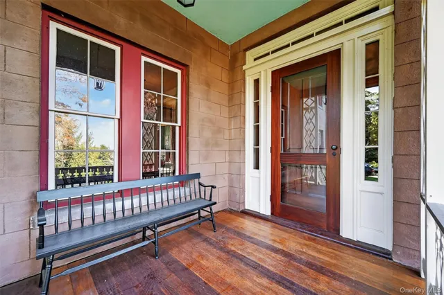 a view of a balcony with a porch