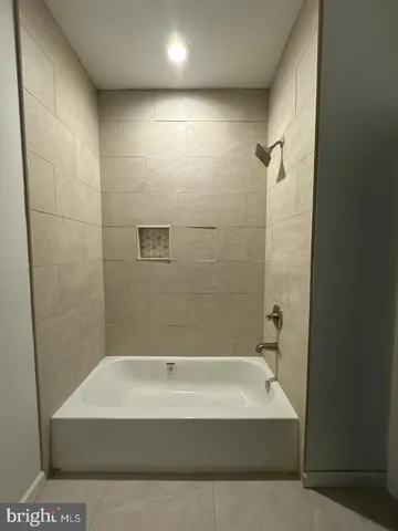 a bathroom with a bathtub