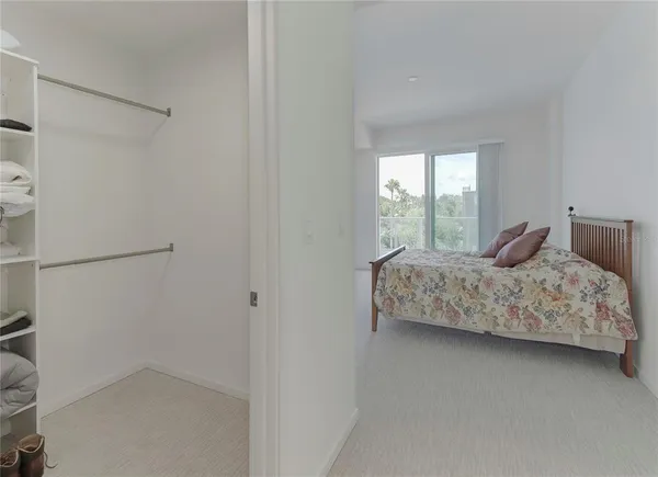 a view of a room with a large window