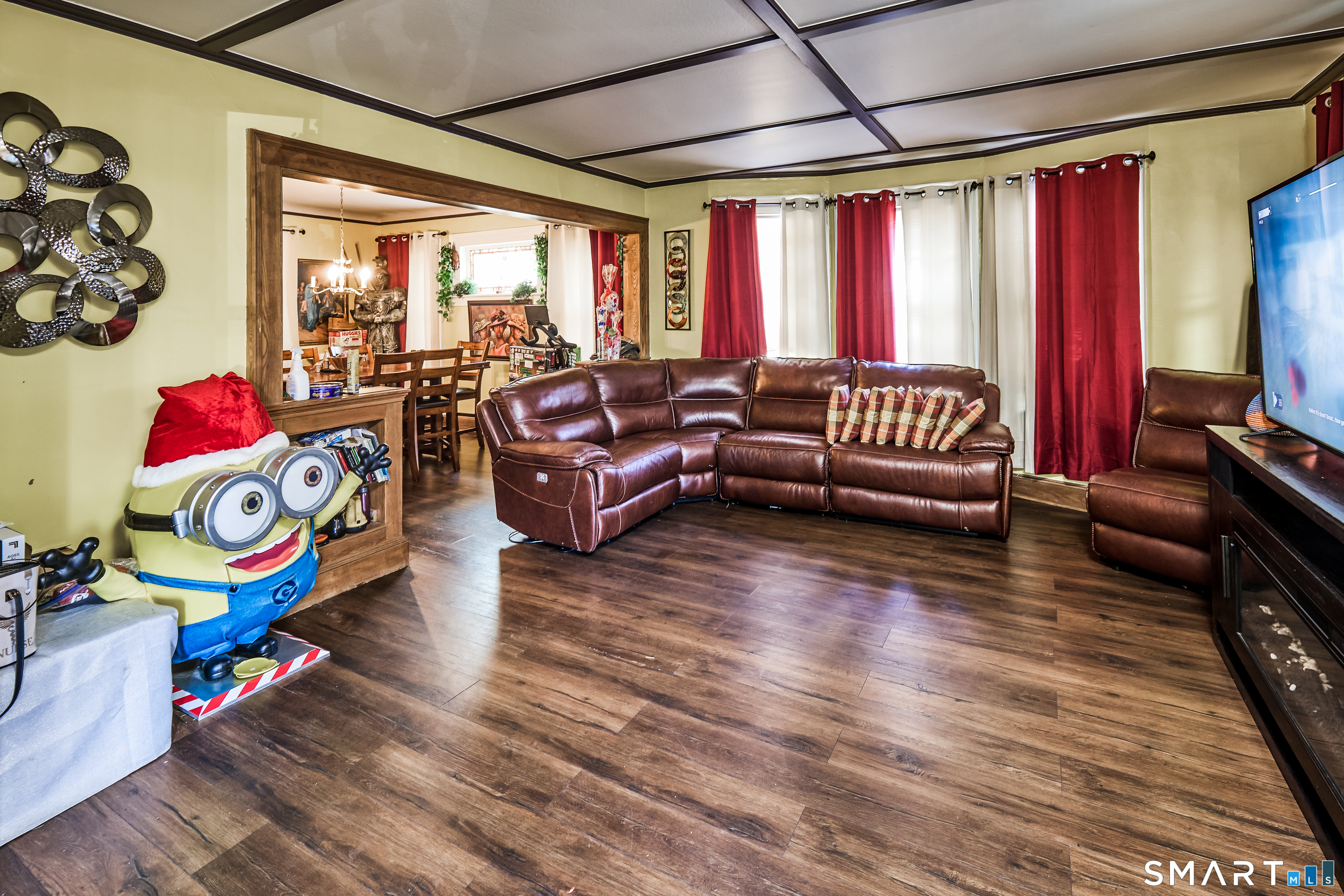 74 Harlem Avenue Bridgeport, CT 06606 - Photo 15 of 40 a living room with furniture and a flat screen tv