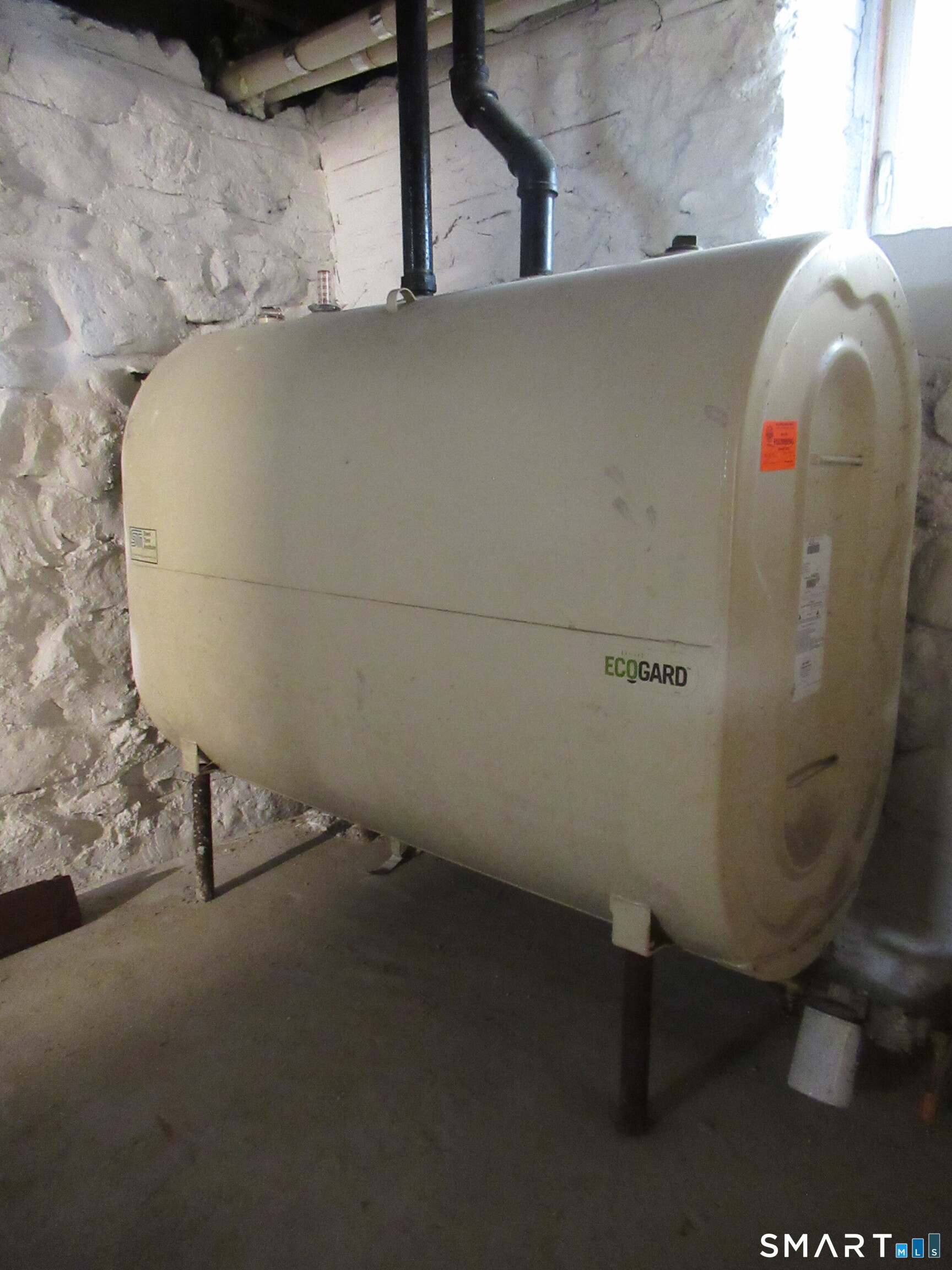 74 Harlem Avenue Bridgeport, CT 06606 - Photo 27 of 40 a close view of water heater room