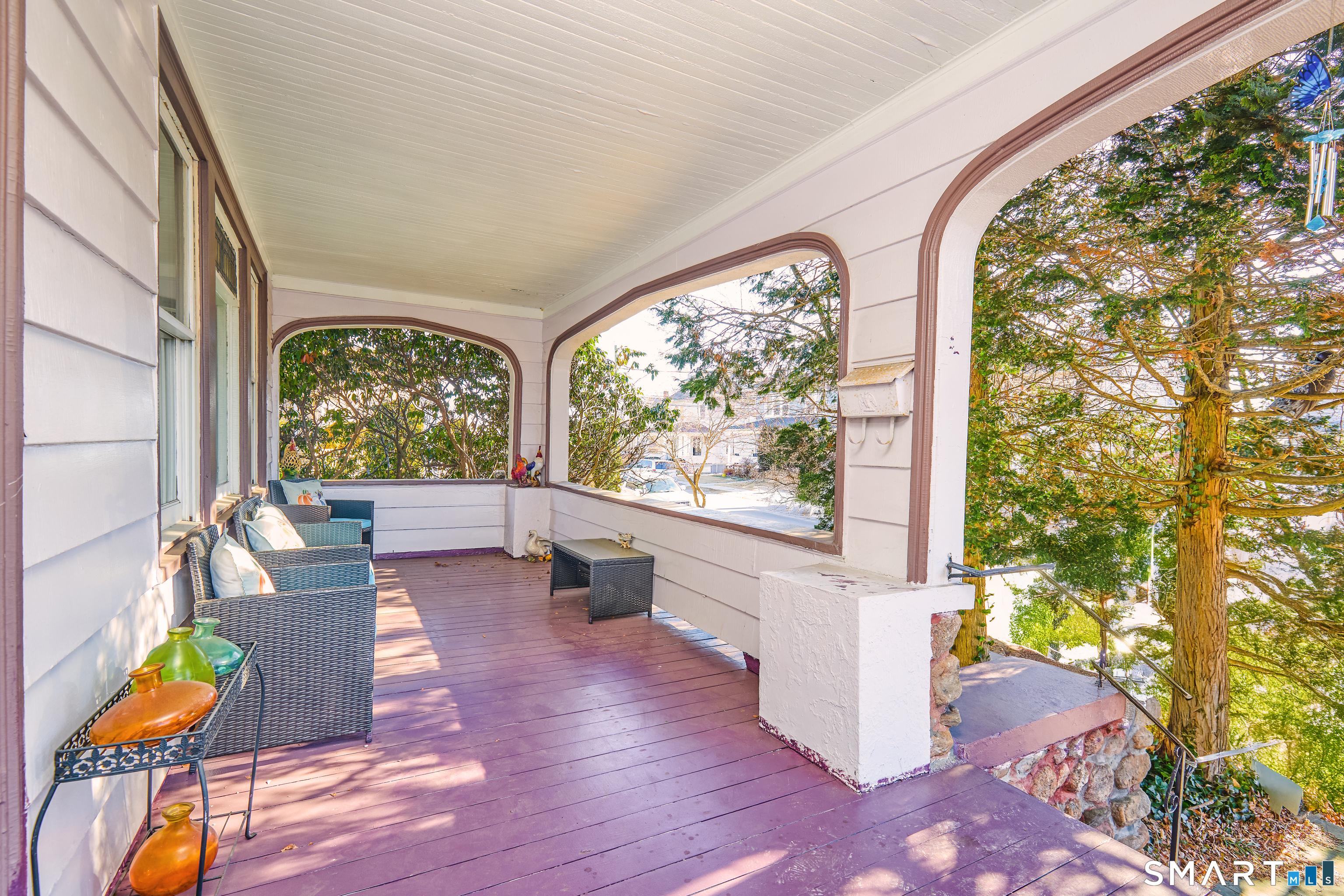 74 Harlem Avenue Bridgeport, CT 06606 - Photo 3 of 40 a living room with furniture and a large window