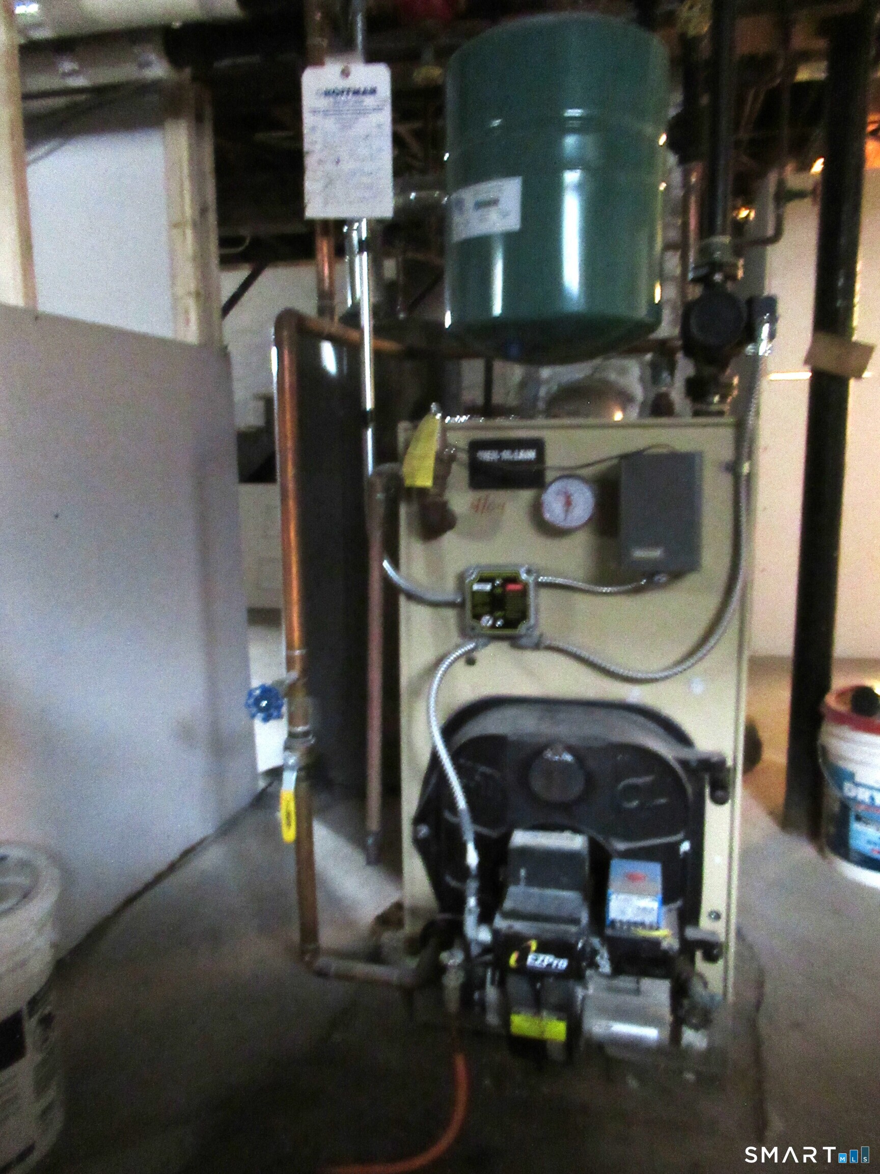 74 Harlem Avenue Bridgeport, CT 06606 - Photo 32 of 40 a room with furniture and gym equipment