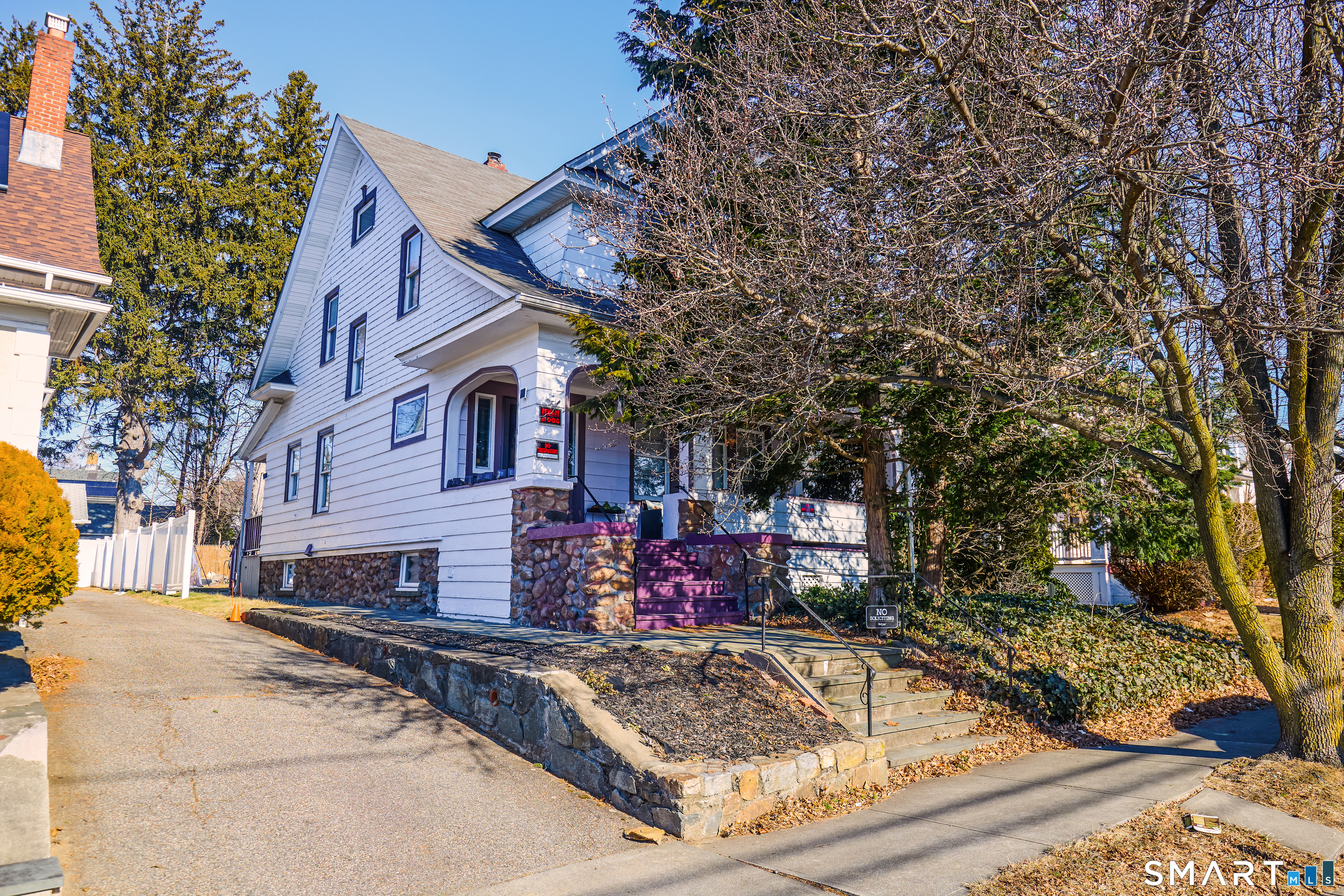 74 Harlem Avenue Bridgeport, CT 06606 - Photo 34 of 40 a view of a house with snow on the road