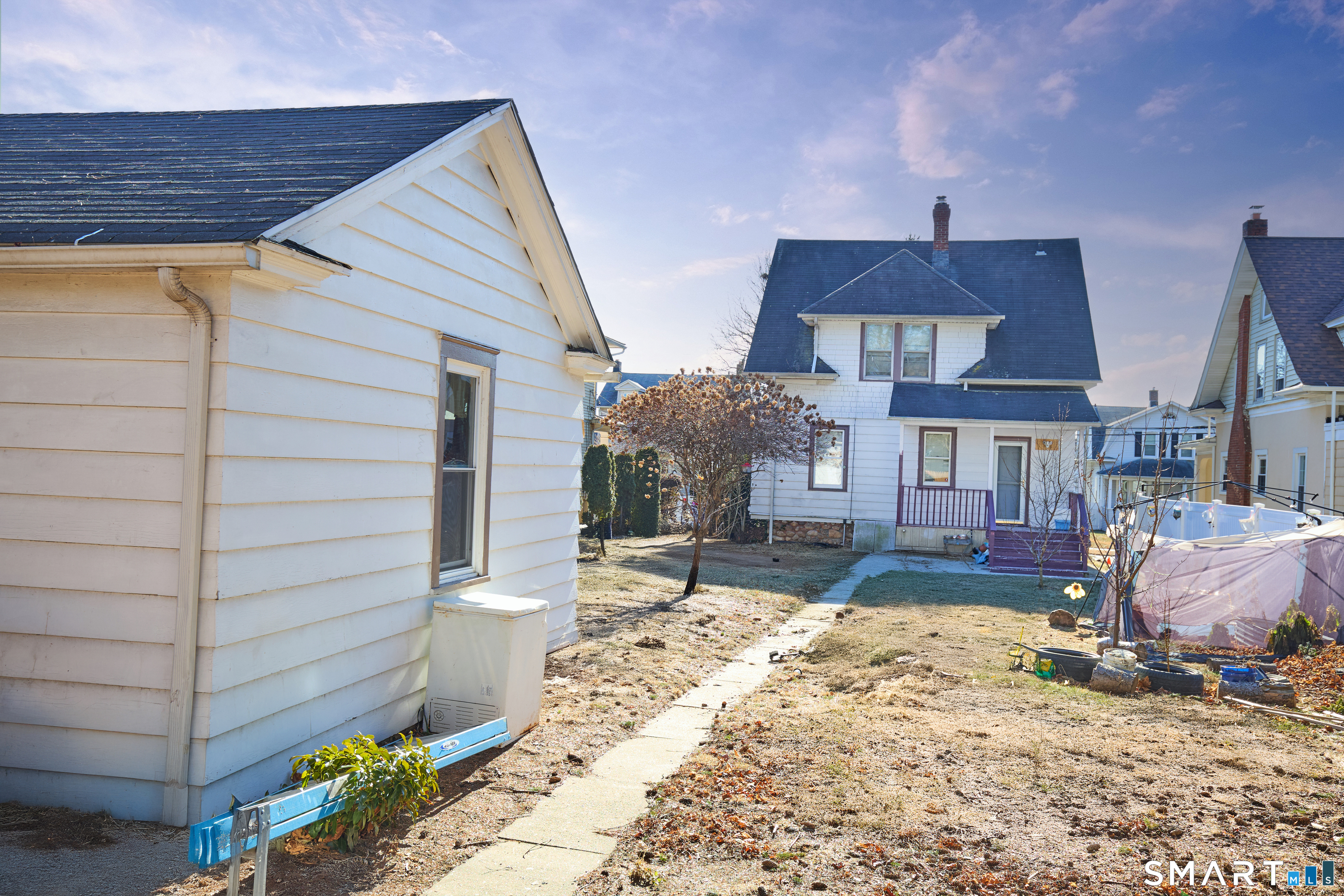 74 Harlem Avenue Bridgeport, CT 06606 - Photo 40 of 40 a front view of a house with a yard