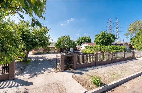 a street view with wooden fence