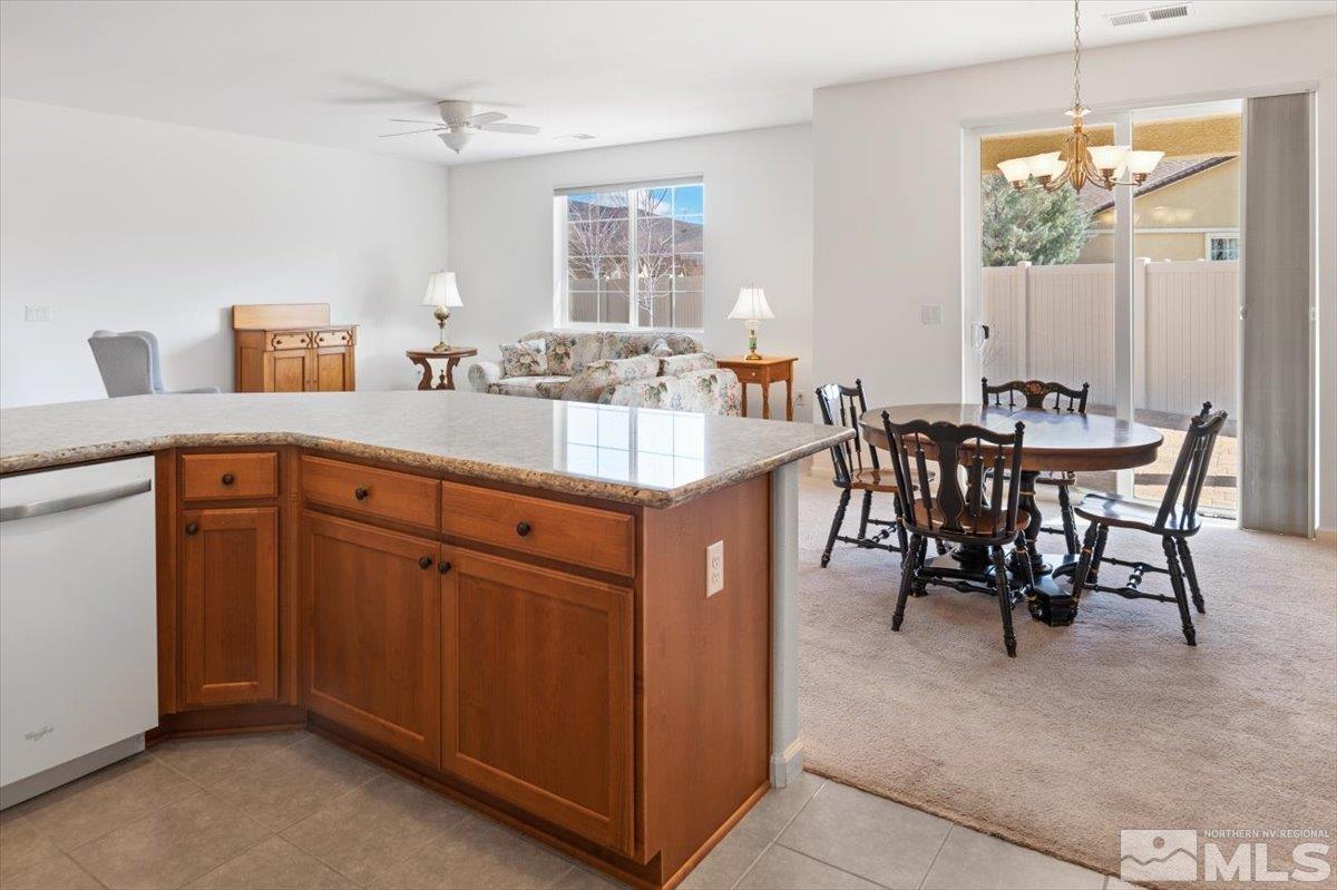 9700 Declan Drive Reno, NV 89521 - Photo 11 of 34 a very nice looking dining room with a table and chairs