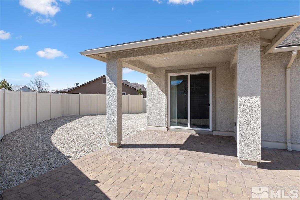 9700 Declan Drive Reno, NV 89521 - Photo 26 of 34 a view of a house with a backyard