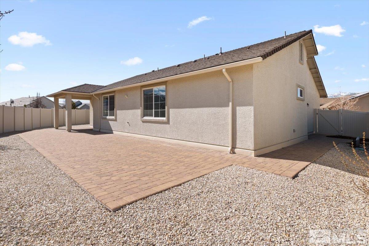 9700 Declan Drive Reno, NV 89521 - Photo 28 of 34 a view of a house with a backyard