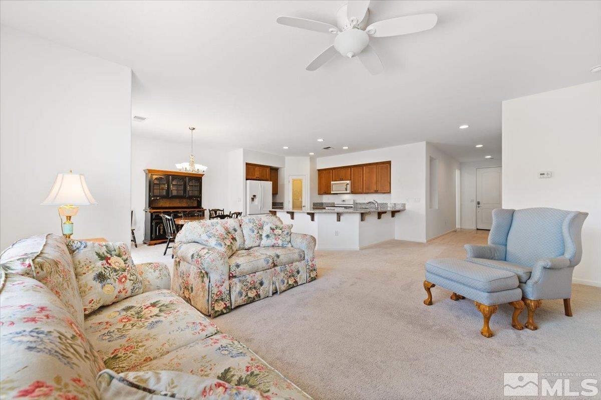 9700 Declan Drive Reno, NV 89521 - Photo 8 of 34 a living room with furniture and kitchen view
