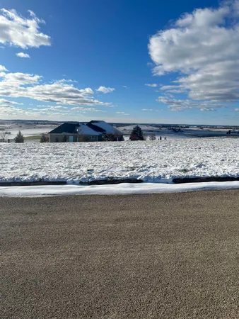 a view of room with wooden floor