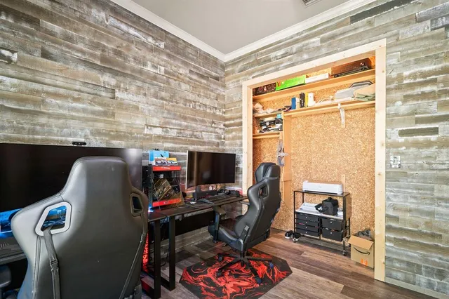 a living room with furniture a rug and a fireplace