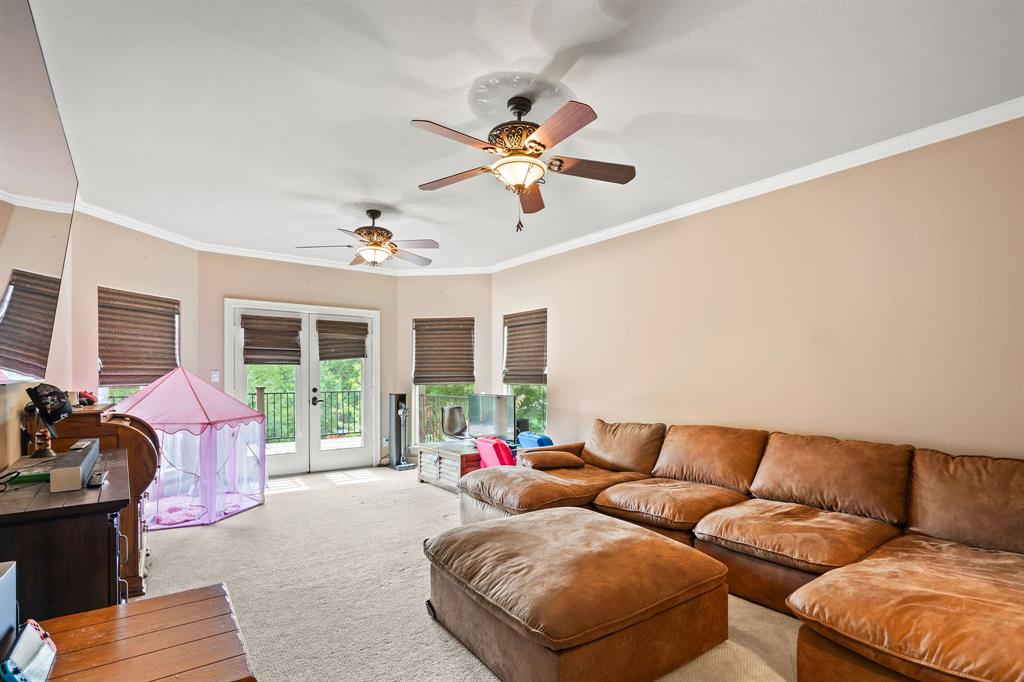 165 Whistler Lane Hallsville, TX 75650 - Photo 21 of 40 a living room with furniture ceiling fan and a window