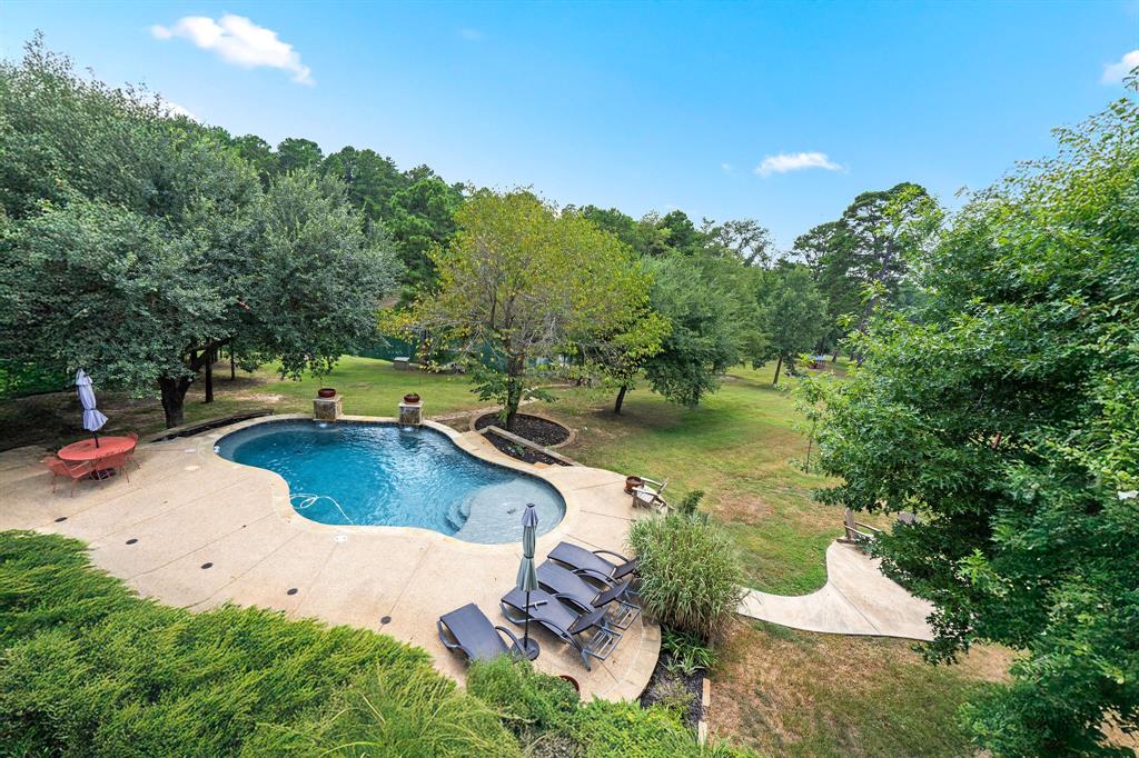 165 Whistler Lane Hallsville, TX 75650 - Photo 26 of 40 an aerial view of a house with swimming pool lake view and mountain view