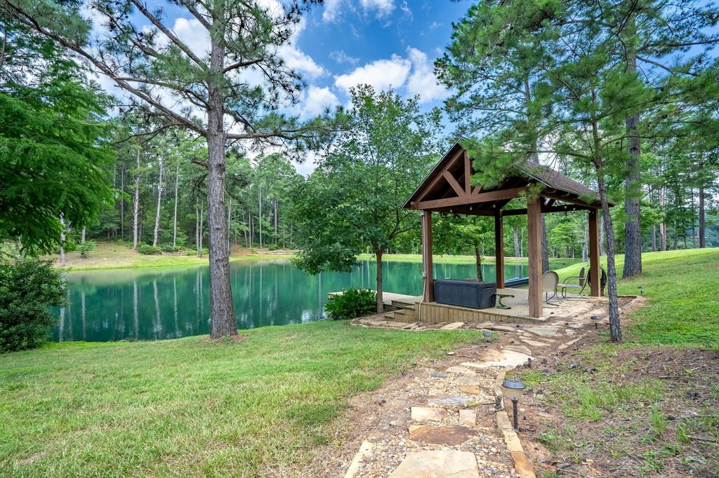 165 Whistler Lane Hallsville, TX 75650 - Photo 39 of 40 a front view of a house with garden