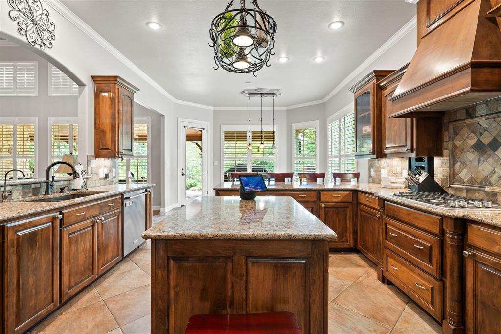 165 Whistler Lane Hallsville, TX 75650 - Photo 5 of 40 a kitchen with counter top space a sink appliances and cabinets