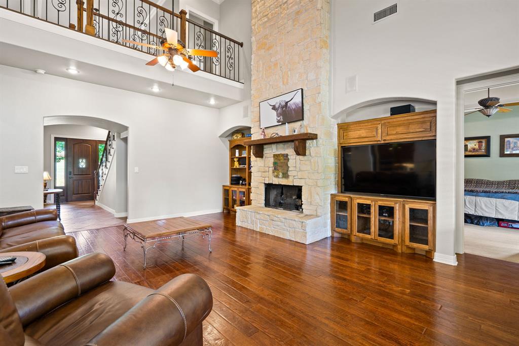 165 Whistler Lane Hallsville, TX 75650 - Photo 8 of 40 a living room with furniture and a flat screen tv