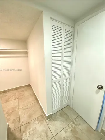 a view of a room with an empty space
