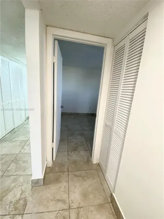 a bathroom with a shower and a toilet