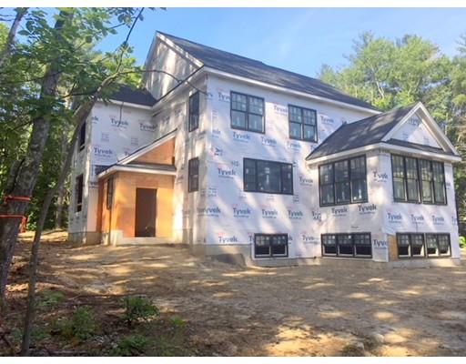 Lot 1 Cobblers Way Hopkinton, MA 01748 - Photo 4 of 5 a front view of a house with a yard