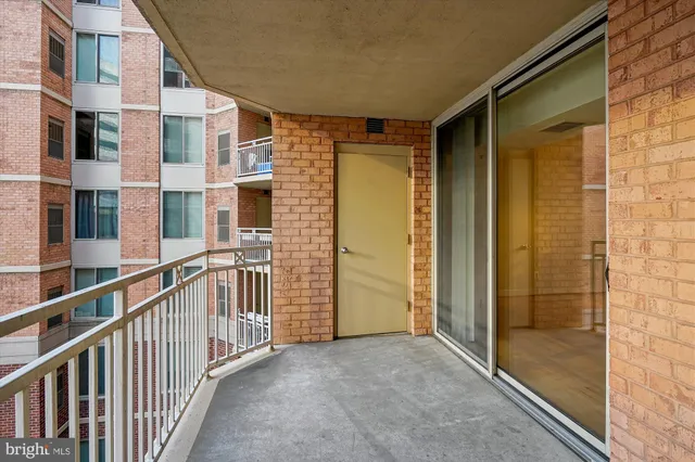 a view of balcony with a glass door
