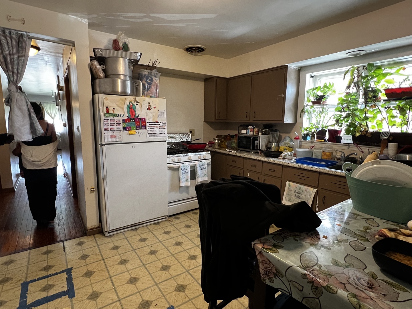 456 North Wolf Road Hillside, IL 60162 - Photo 3 of 16 a kitchen with a refrigerator and a stove