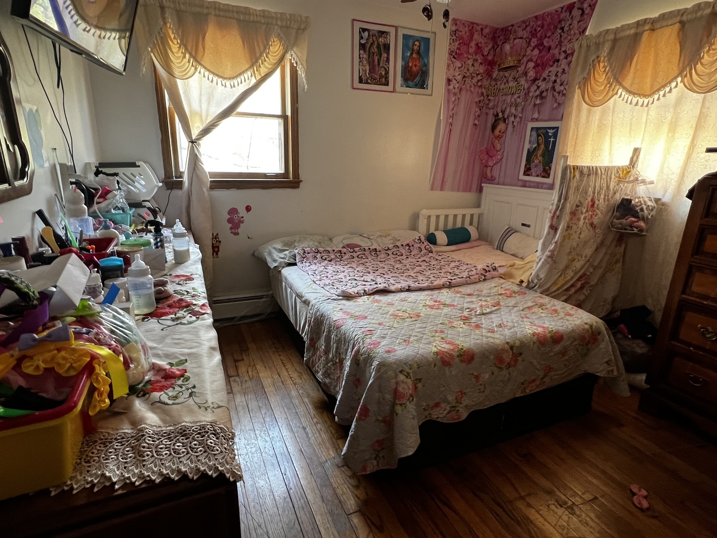 456 North Wolf Road Hillside, IL 60162 - Photo 5 of 16 a bed sitting in a bedroom next to a window