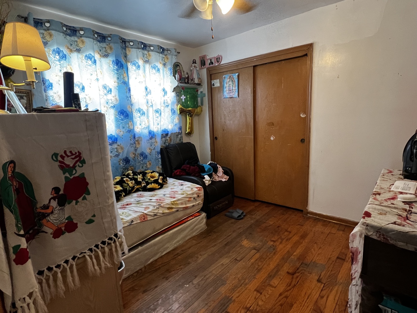 456 North Wolf Road Hillside, IL 60162 - Photo 6 of 16 a bedroom with a bed and a couch
