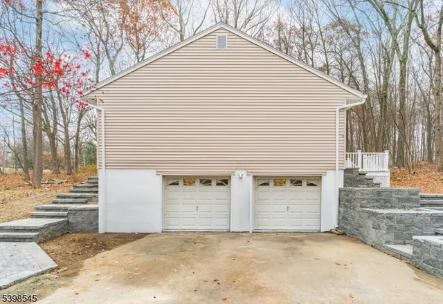 a view of a house with a garage