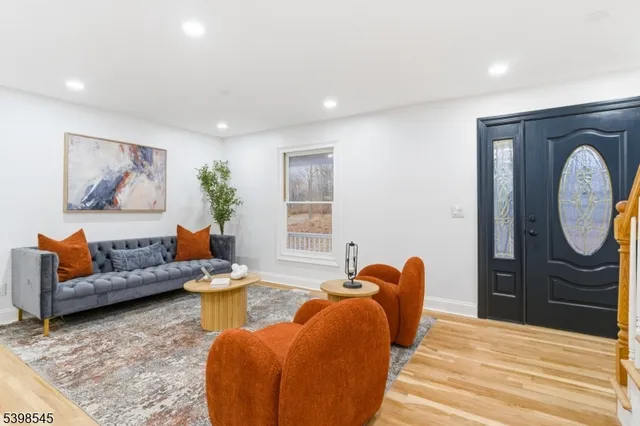 a bed room with furniture and a window