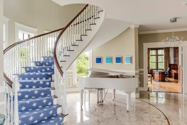 a view of staircase with wooden floor