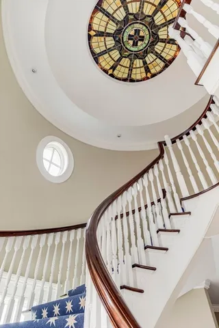 a bathroom with a sink mirror and vanity