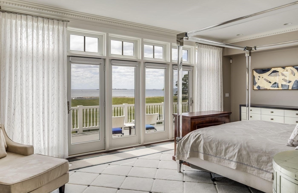 76 Paine Avenue Beverly, MA 01965 - Photo 23 of 41 a bedroom with a bed and a window