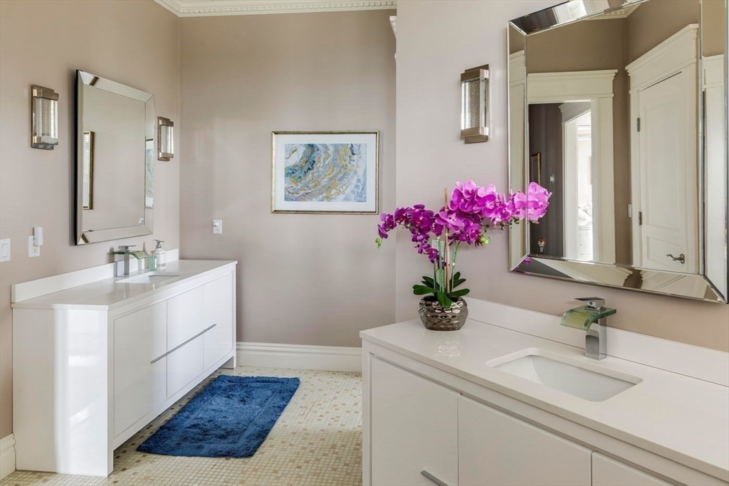 76 Paine Avenue Beverly, MA 01965 - Photo 24 of 41 a bathroom with a sink mirror and vanity