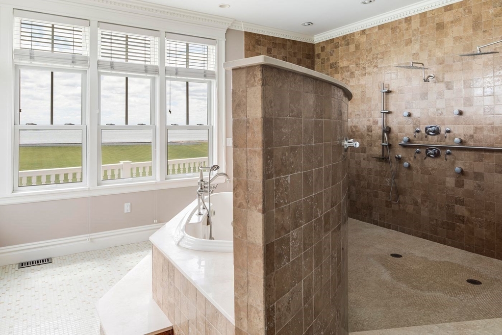 76 Paine Avenue Beverly, MA 01965 - Photo 25 of 41 a bathroom with a bathtub and a shower