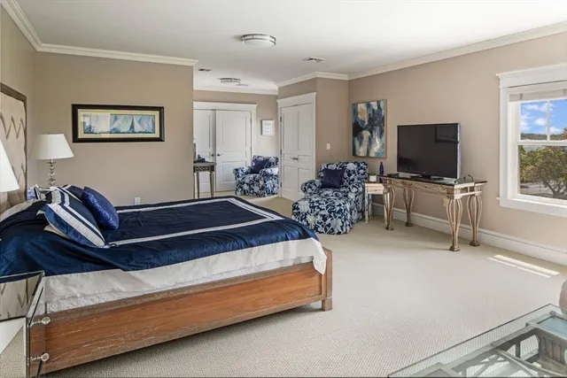 a view of a livingroom with furniture and window