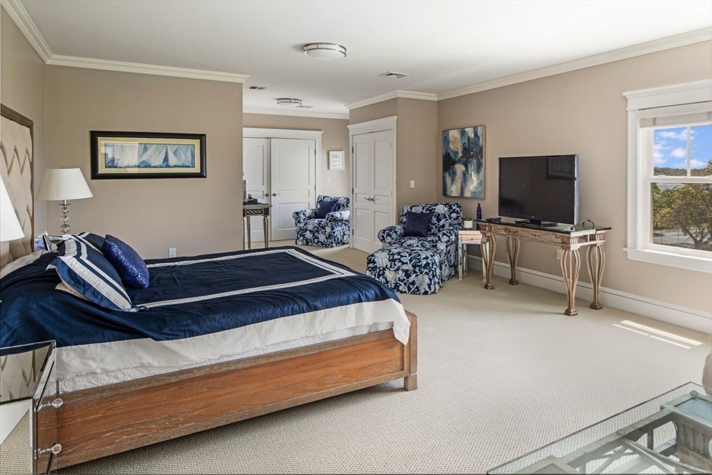 76 Paine Avenue Beverly, MA 01965 - Photo 27 of 41 a living room with furniture and a flat screen tv
